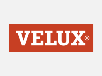 Logo VELUX in Farbe auf grauem Hintergrund