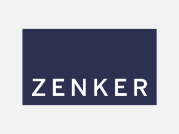 Logo ZENKER in Farbe auf grauem Hintergrund