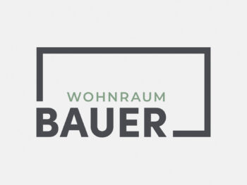 Logo Tischlerei Bauer in Farbe auf grauem Hintergrund